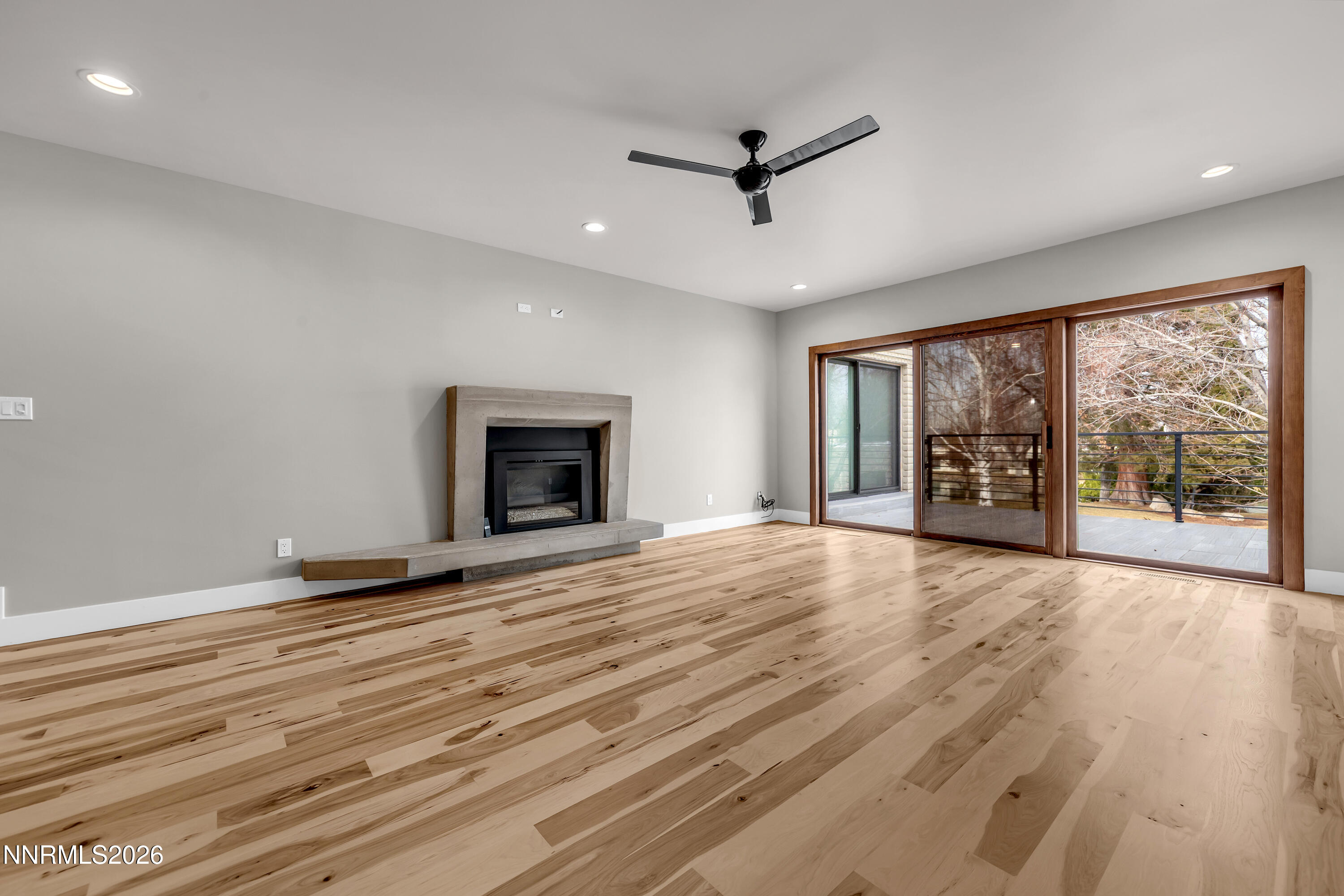 4957 Lakeridge Terrace West Reno, NV 89509 - Photo 15 of 44 a view of an empty room with a window and a kitchen