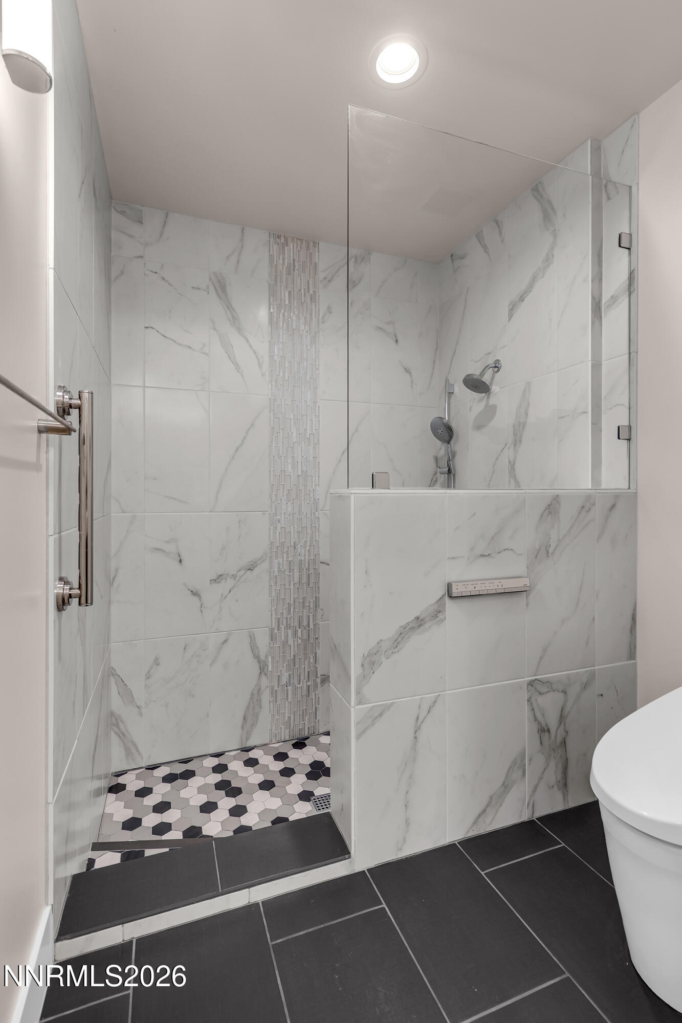 4957 Lakeridge Terrace West Reno, NV 89509 - Photo 22 of 44 a bathroom with a toilet and a shower