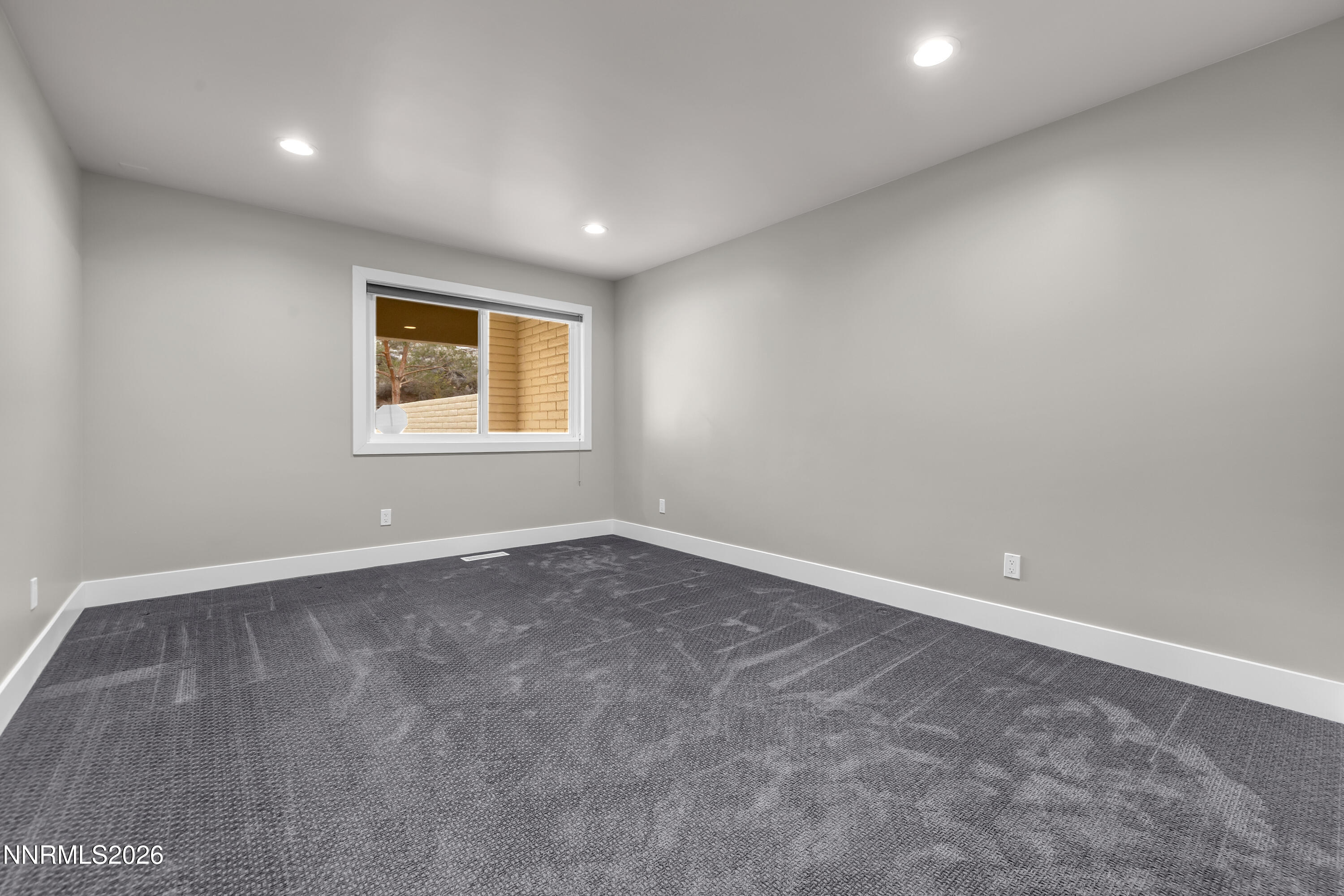4957 Lakeridge Terrace West Reno, NV 89509 - Photo 25 of 44 an empty room with a window
