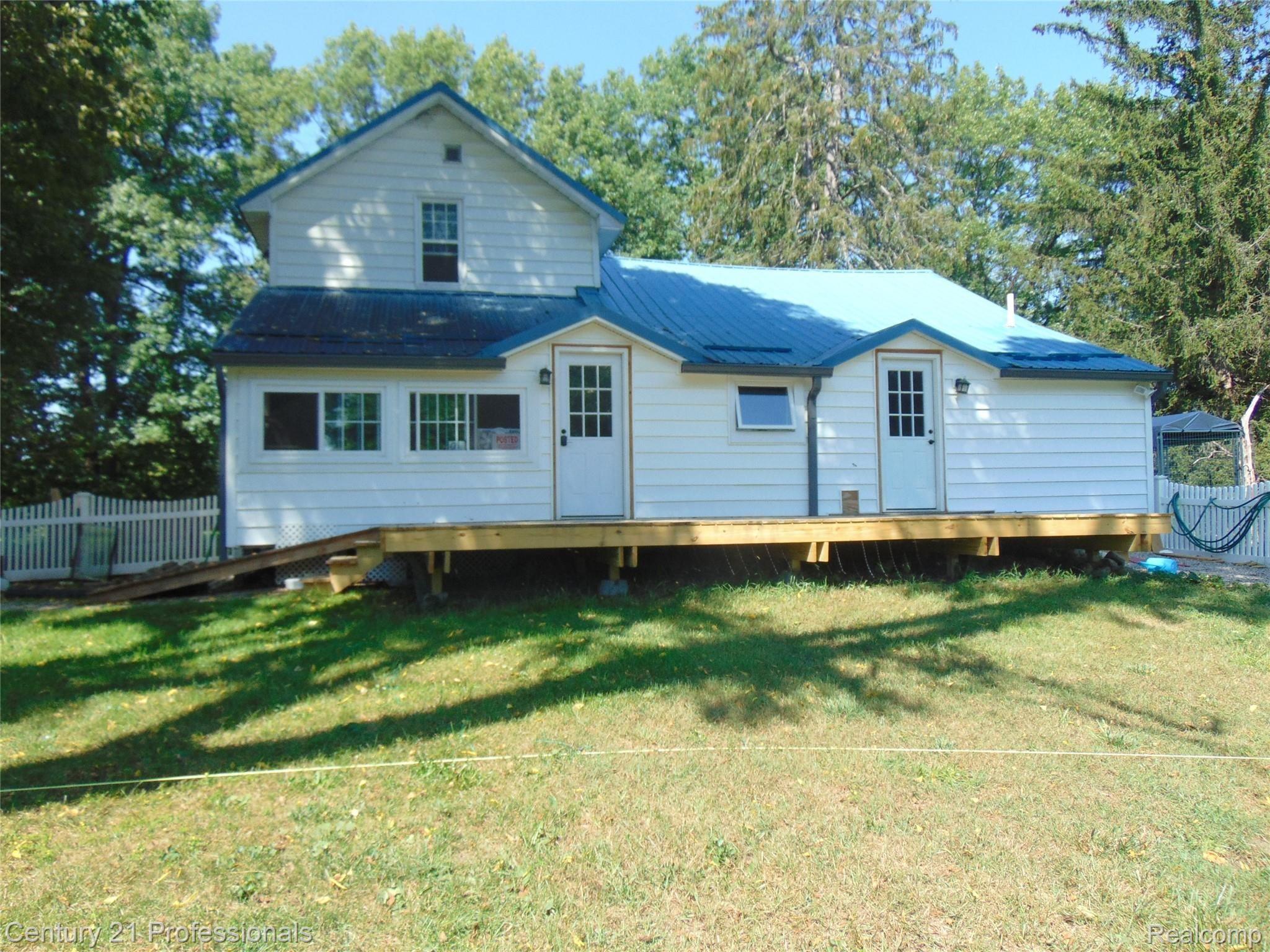 7222 Tucker Road Holly, MI 48442 - Photo 35 of 36 Back View of Tucker Road Farmhouse.....