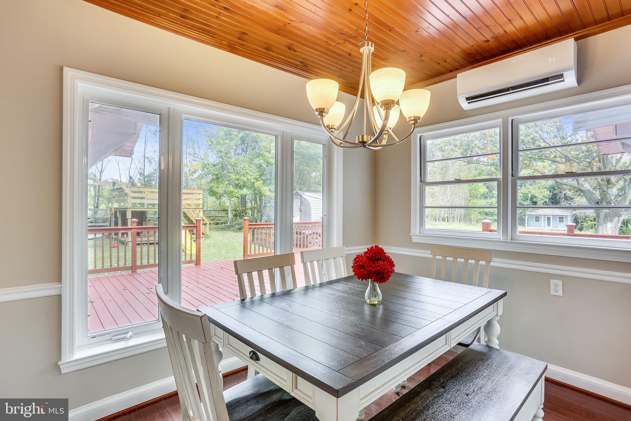 28804 Ridge Road Mount Airy, MD 21771 - Photo 11 of 39 breakfast nook overlooking rear deck & yard
