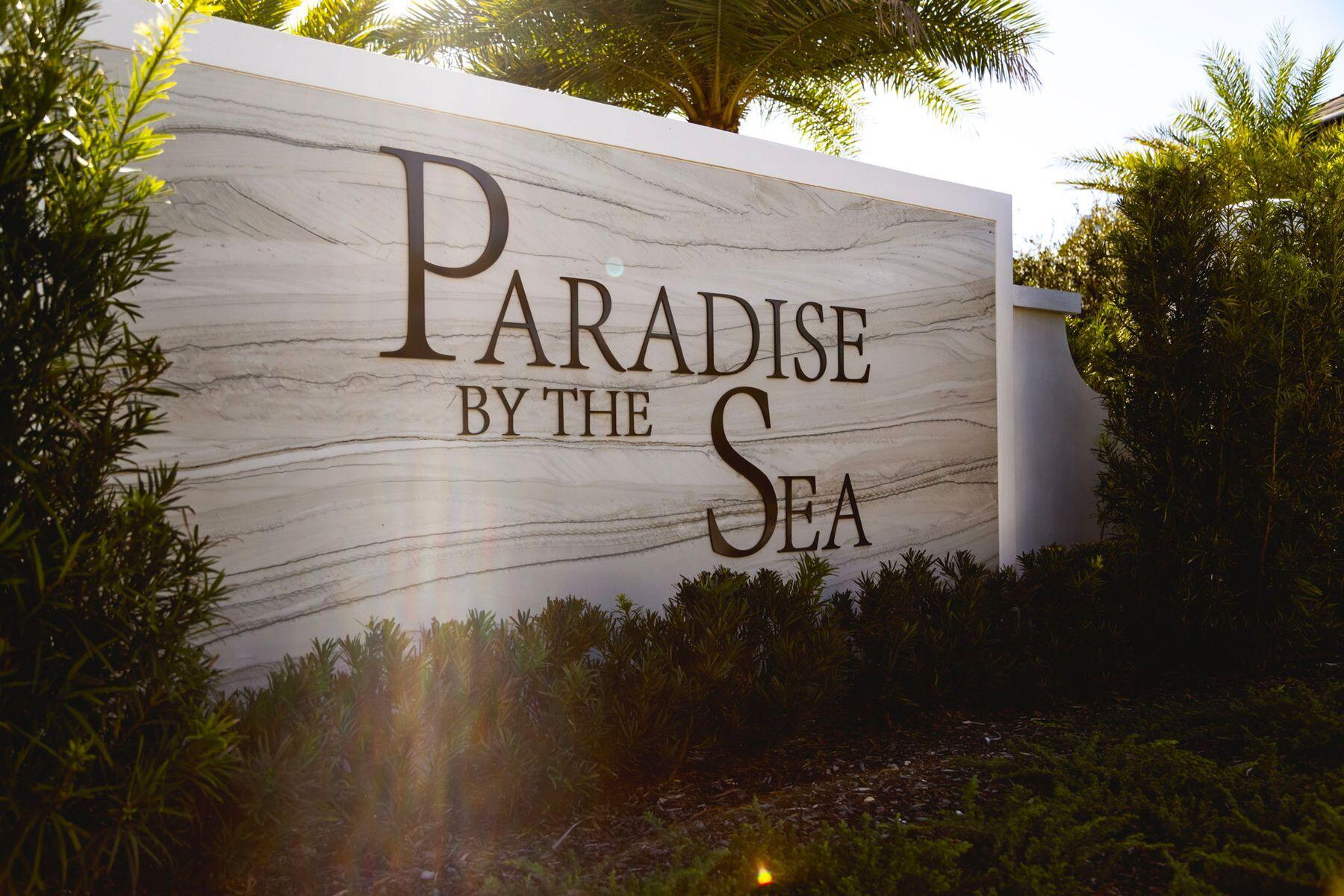 Lot 6 Paradise By The Sea Ct Inlet Beach Inlet Beach, FL 32461 - Photo 13 of 23 a sign on the side of a building