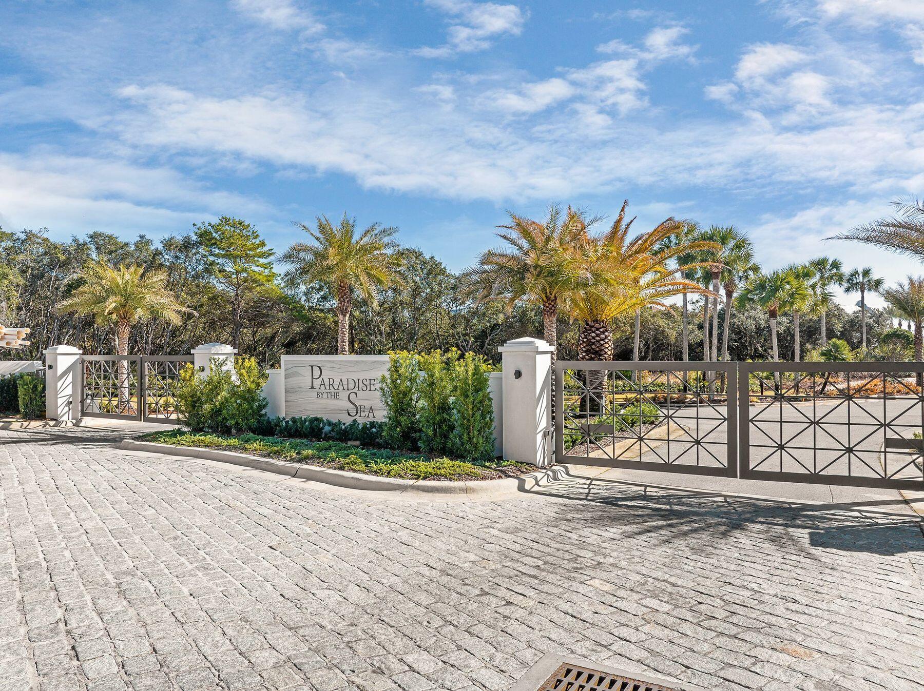 Lot 6 Paradise By The Sea Ct Inlet Beach Inlet Beach, FL 32461 - Photo 15 of 23 a view of a street with a building in the background