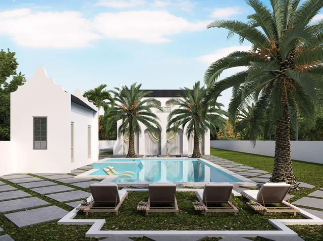 a front view of a house with swimming pool and sitting area