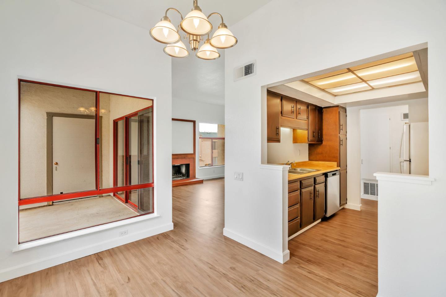 2416 North Main Street, Unit F Salinas, CA 93906 - Photo 13 of 39 a view of a kitchen cabinets and wooden floor