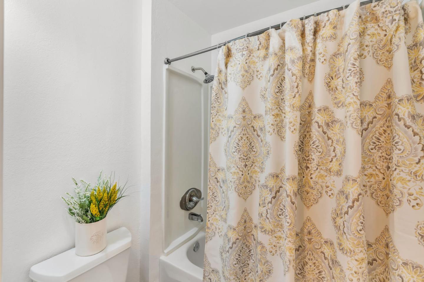 2416 North Main Street, Unit F Salinas, CA 93906 - Photo 16 of 39 a bathroom with a sink a toilet and shower