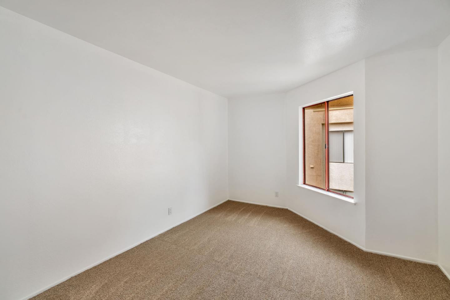 2416 North Main Street, Unit F Salinas, CA 93906 - Photo 25 of 39 an empty room with a window