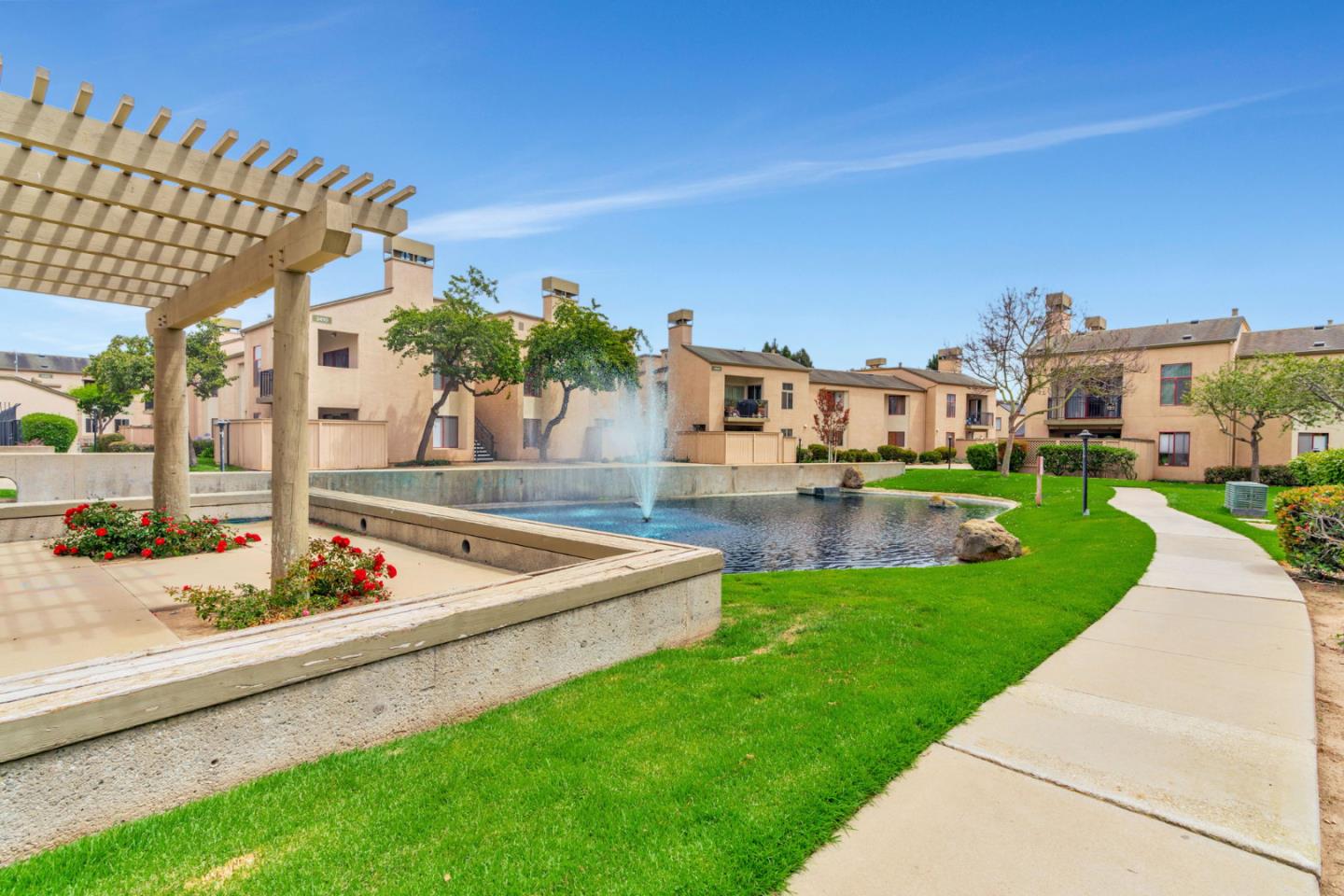 2416 North Main Street, Unit F Salinas, CA 93906 - Photo 35 of 39 a view of a house with a swimming pool