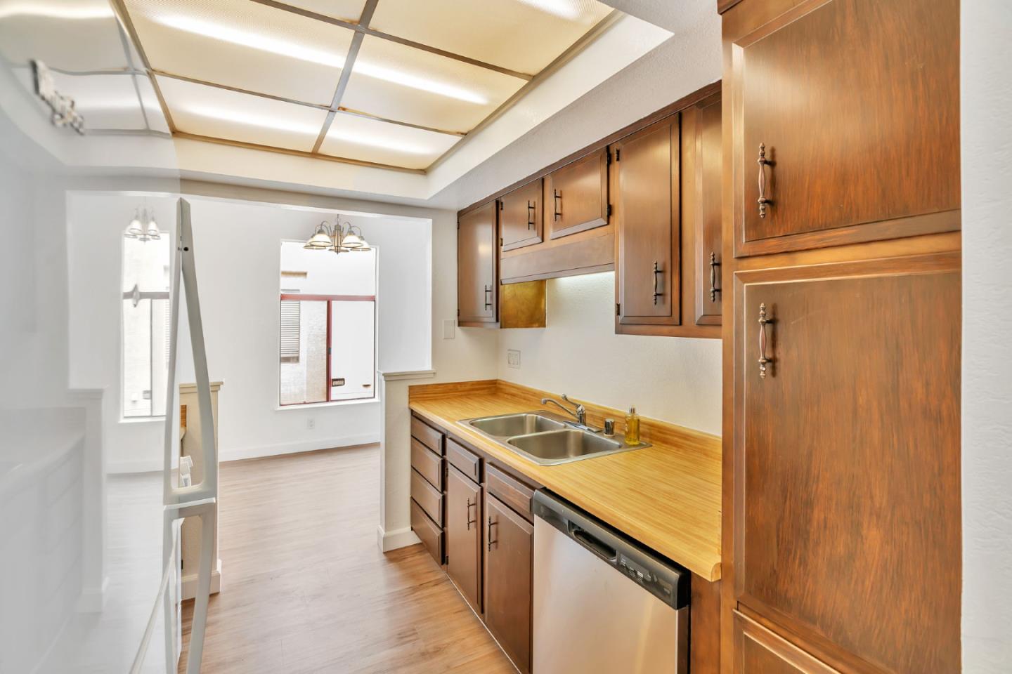 2416 North Main Street, Unit F Salinas, CA 93906 - Photo 10 of 39 a kitchen with a stove and a refrigerator
