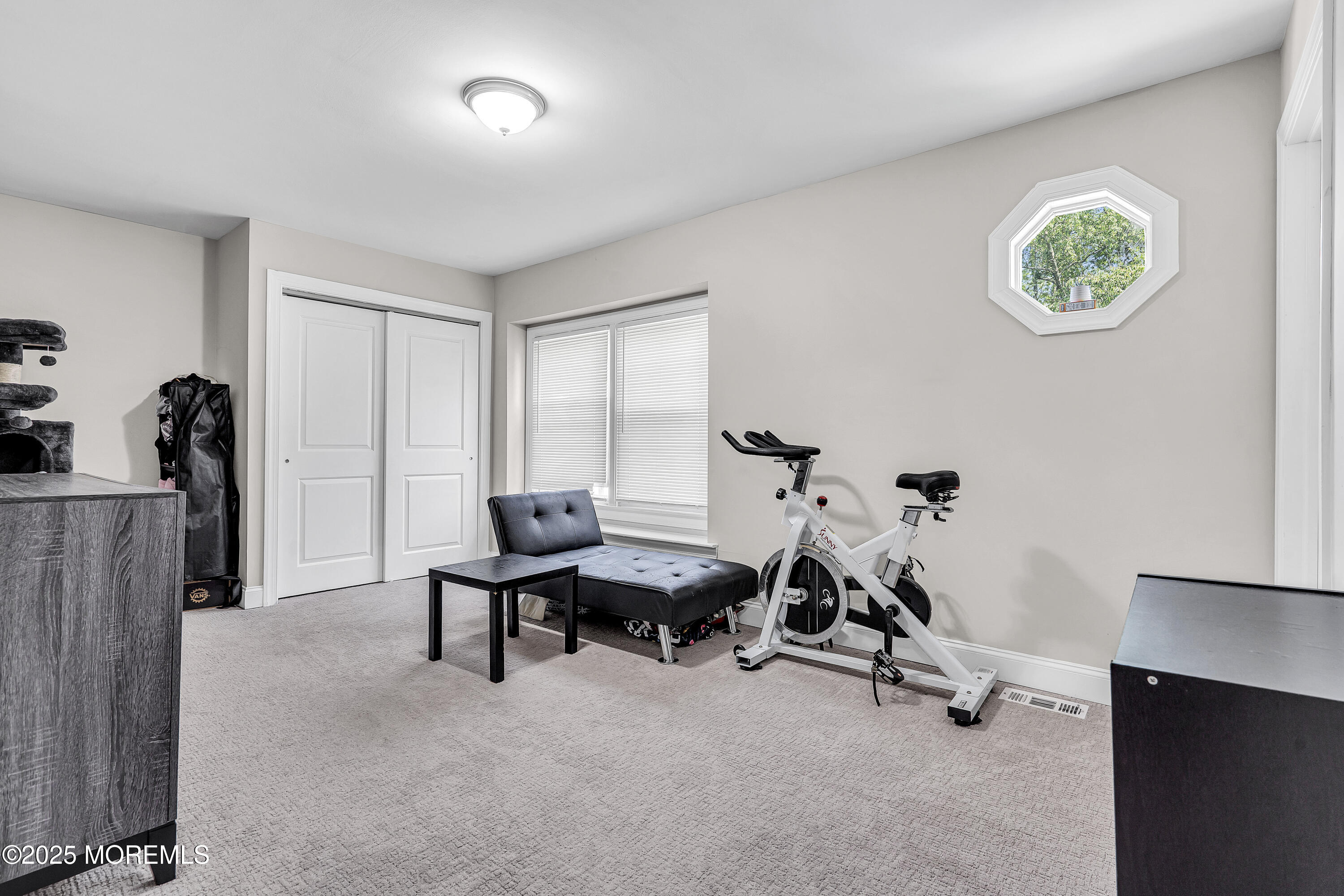 39 Colonial Court Jackson, NJ 08527 - Photo 13 of 26 a view of a workspace with furniture and a window