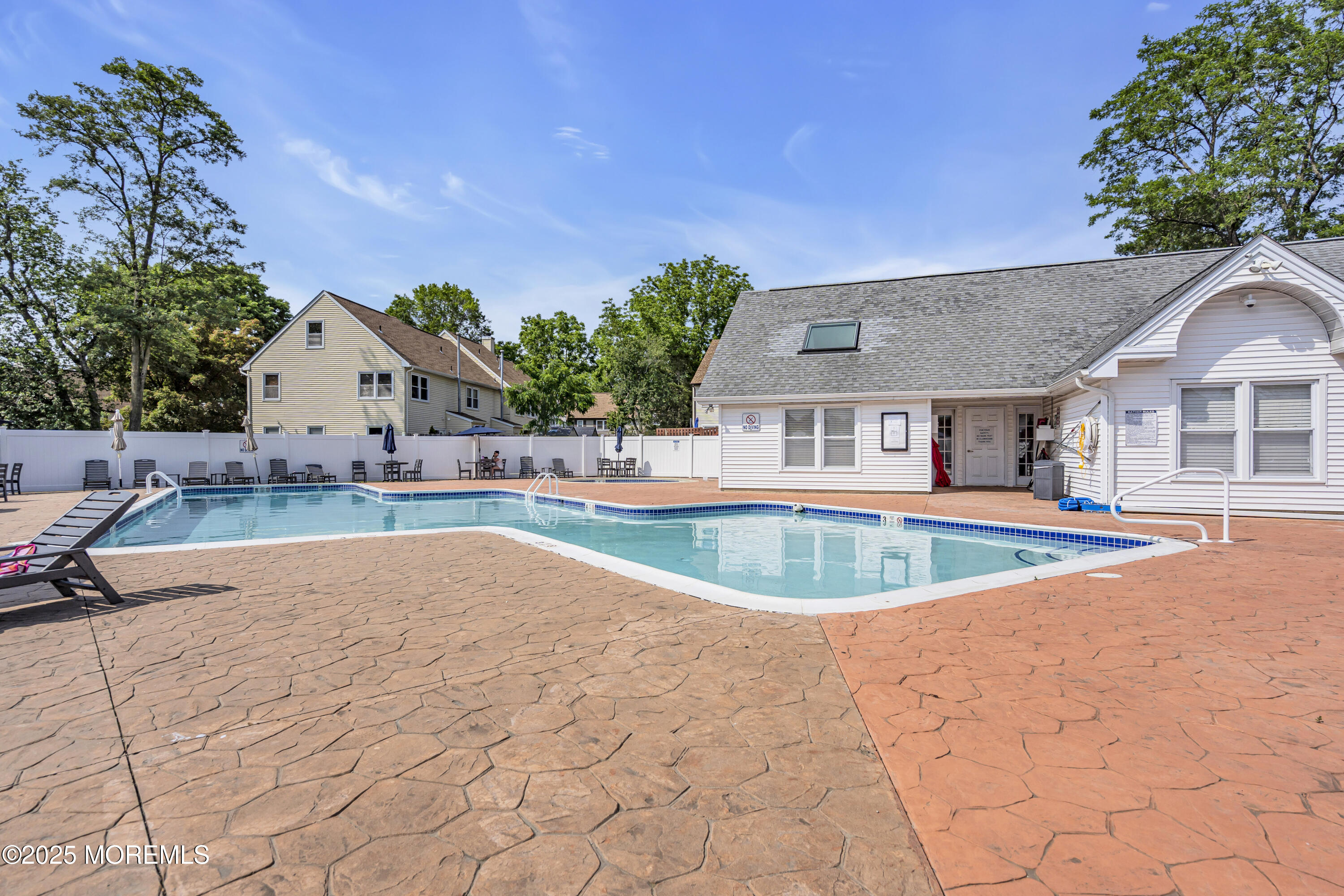 39 Colonial Court Jackson, NJ 08527 - Photo 17 of 26 a view of house with swimming pool and yard