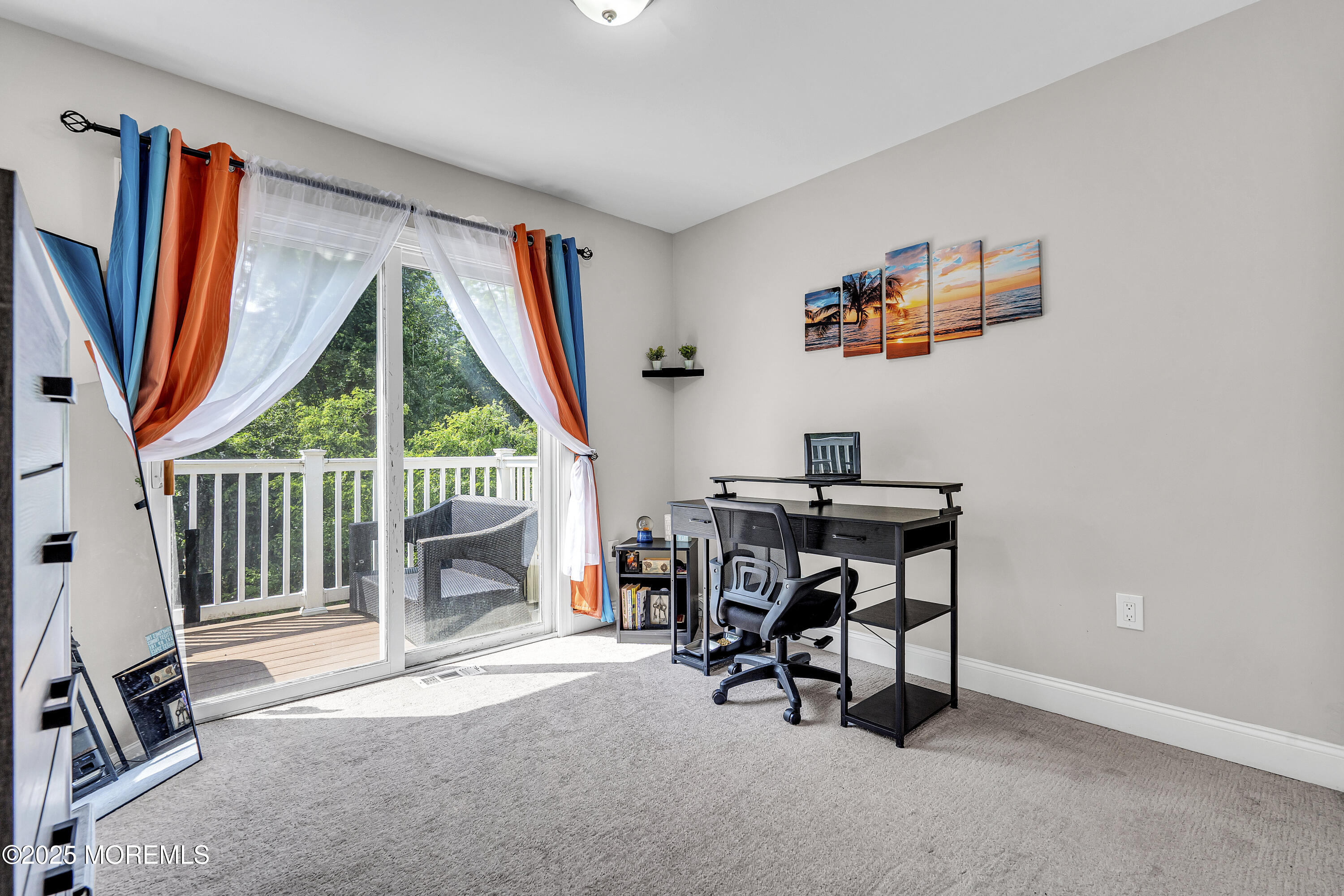 39 Colonial Court Jackson, NJ 08527 - Photo 24 of 26 a view of a workspace with furniture and a window