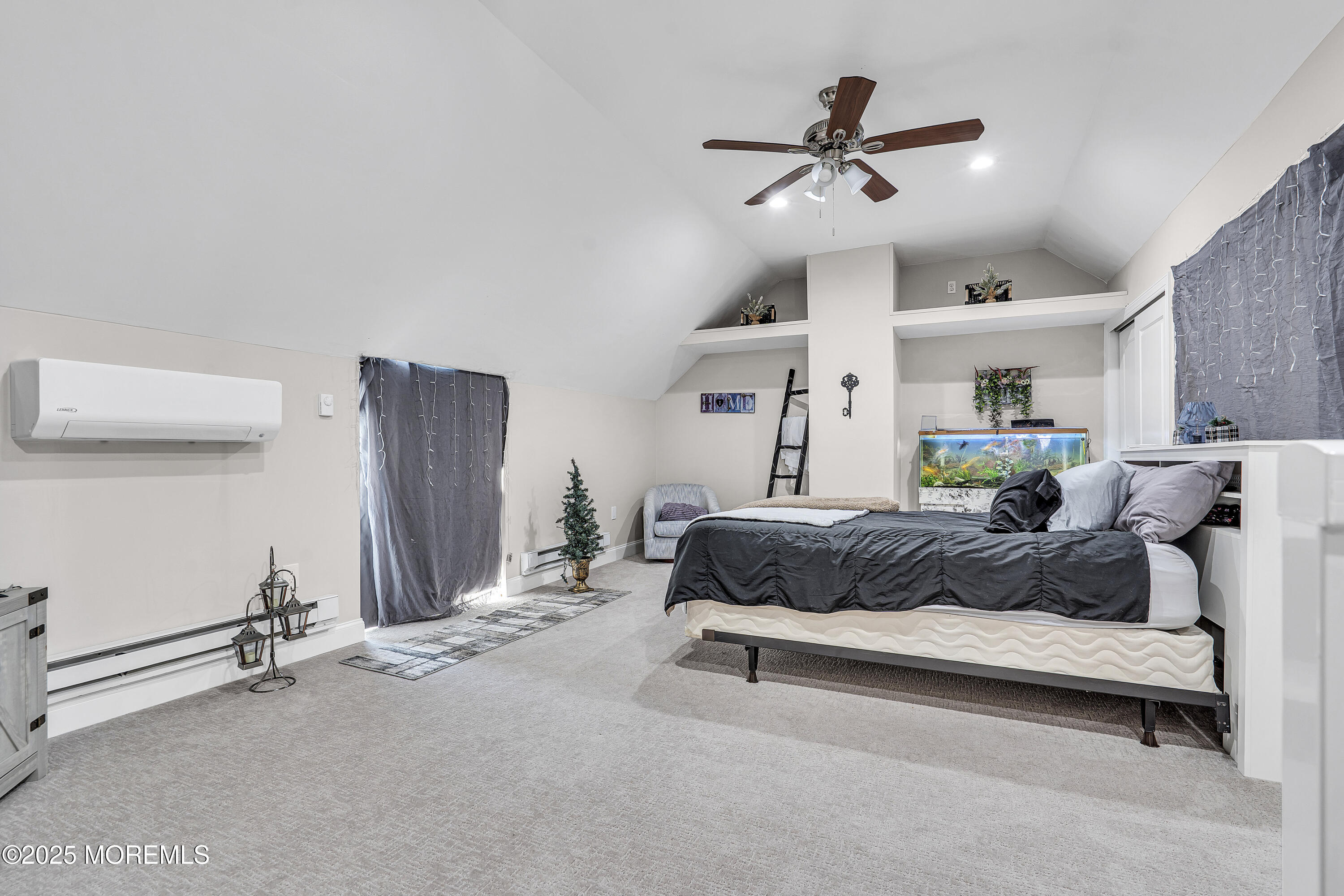 39 Colonial Court Jackson, NJ 08527 - Photo 25 of 26 a living room with furniture and a ceiling fan