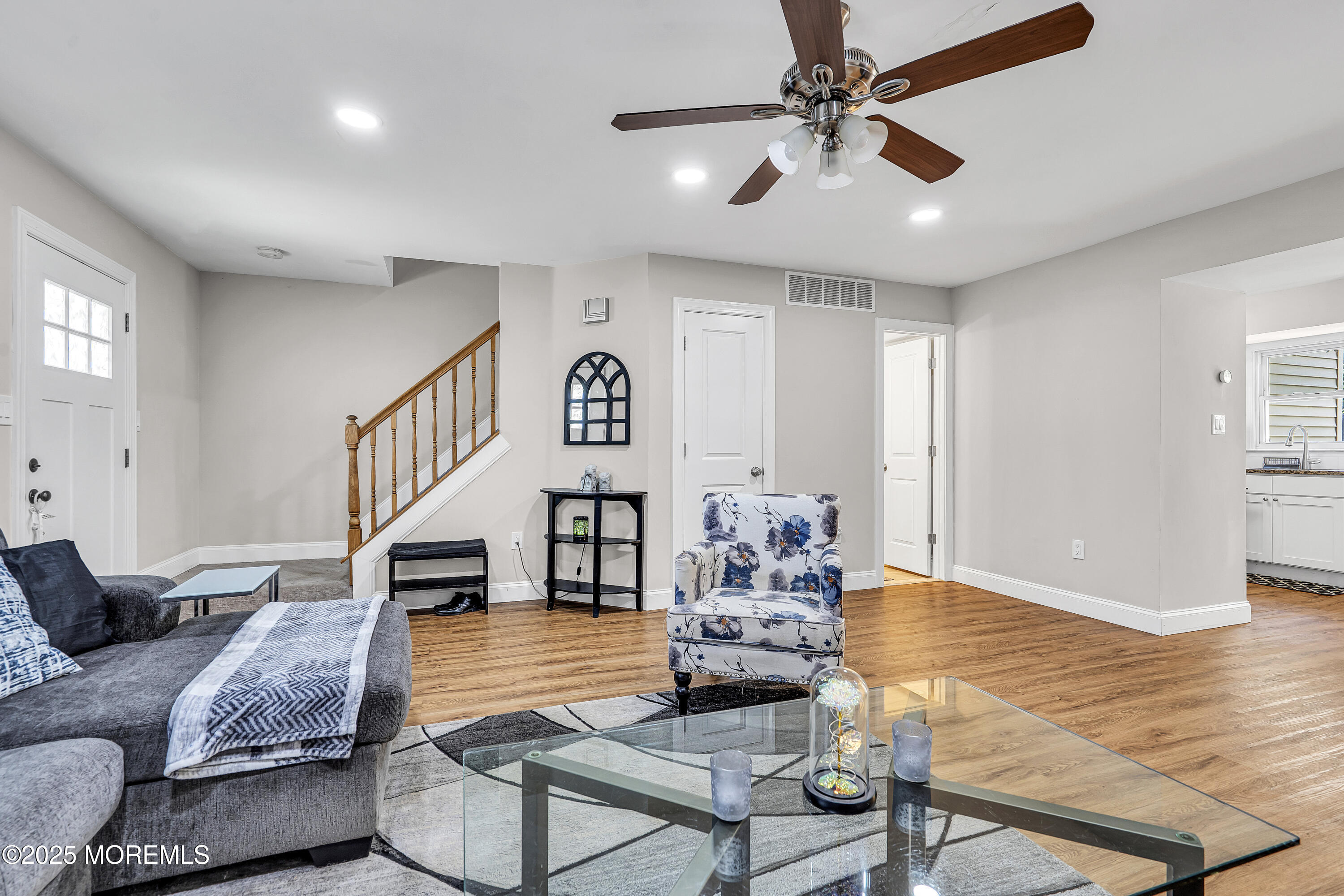 39 Colonial Court Jackson, NJ 08527 - Photo 5 of 26 a living room with furniture and a wooden floor