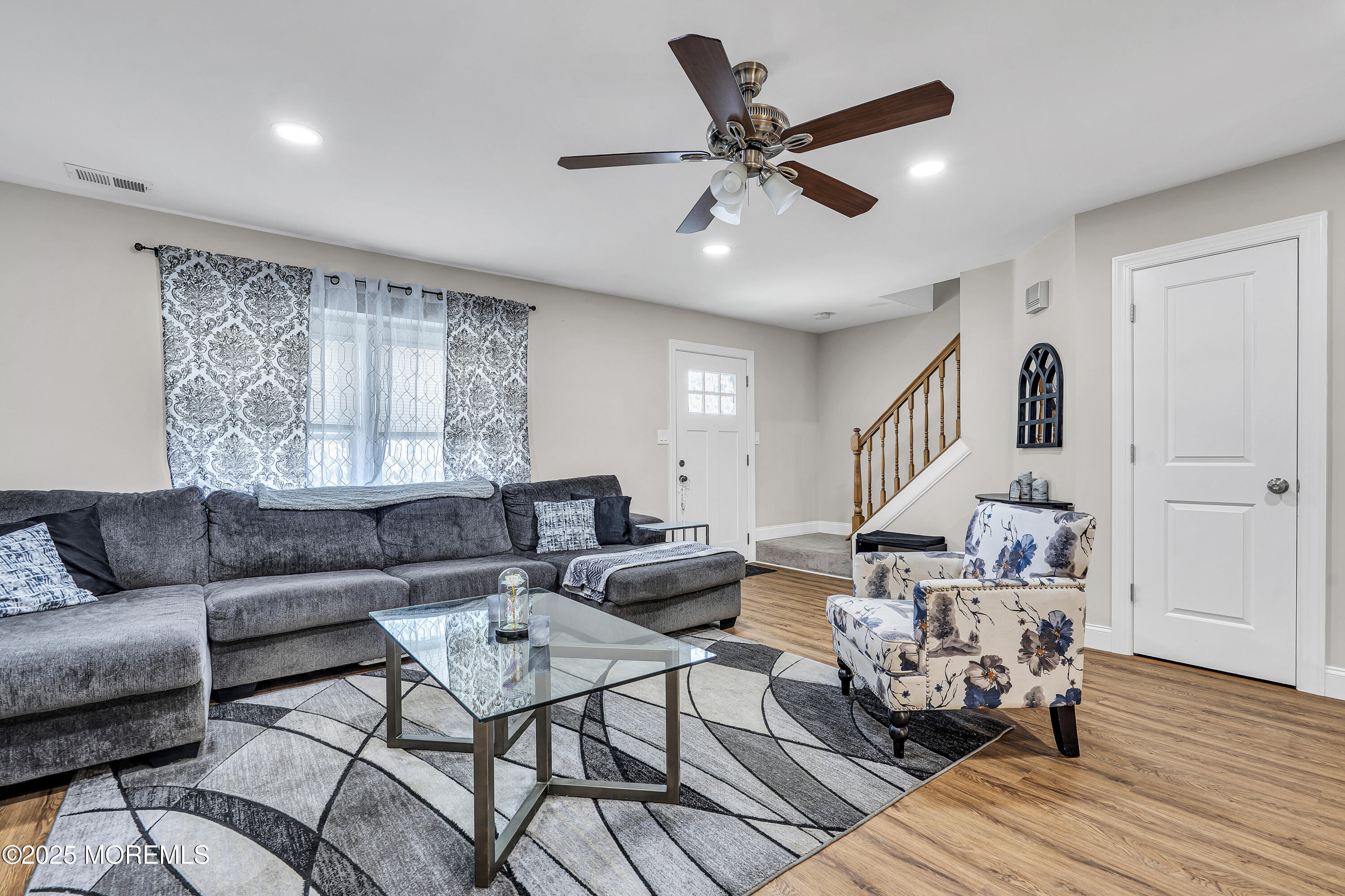 39 Colonial Court Jackson, NJ 08527 - Photo 6 of 26 a living room with furniture and a wooden floor
