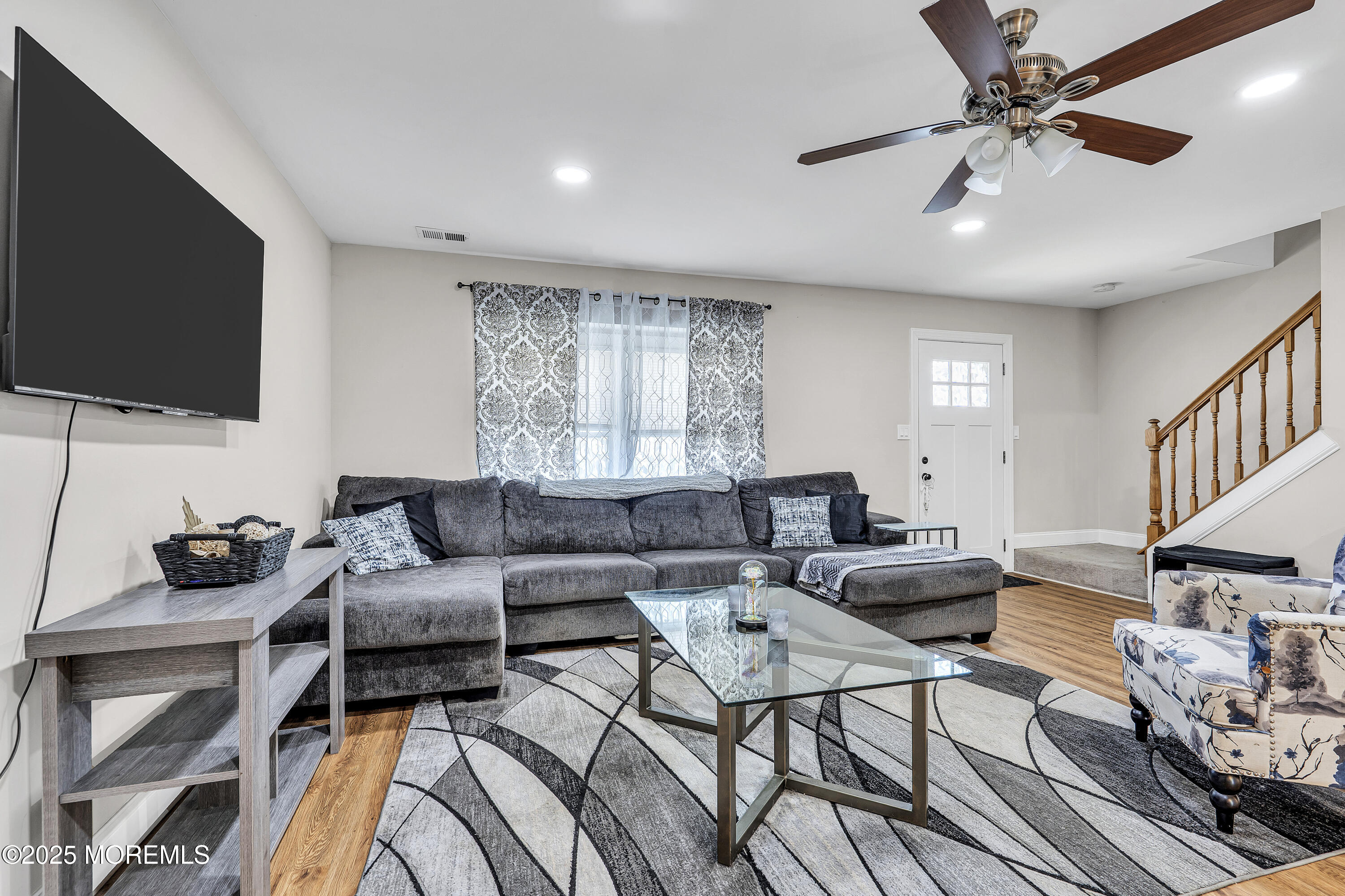 39 Colonial Court Jackson, NJ 08527 - Photo 8 of 26 a living room with furniture and a flat screen tv