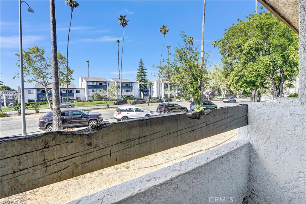 19620 Sherman Way, Unit 1 Reseda, CA 91335 - Photo 17 of 29 a view of a lake with a car parked on the roadside