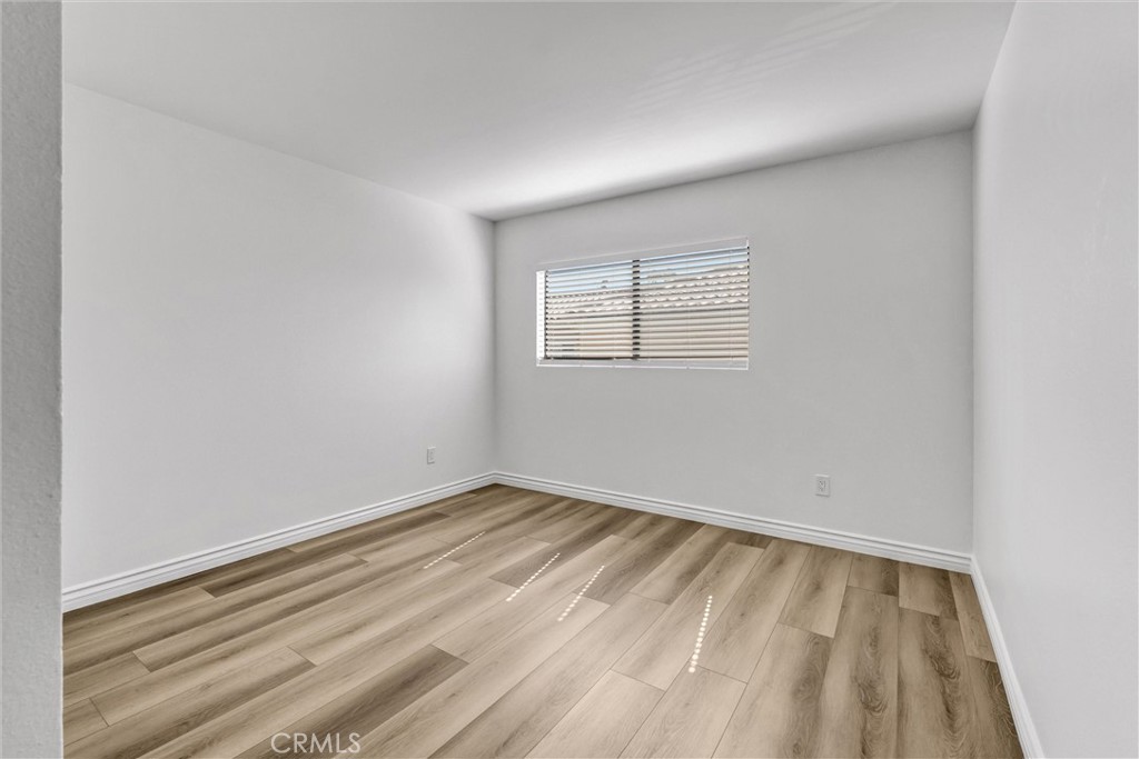 19620 Sherman Way, Unit 1 Reseda, CA 91335 - Photo 20 of 29 an empty room with a window