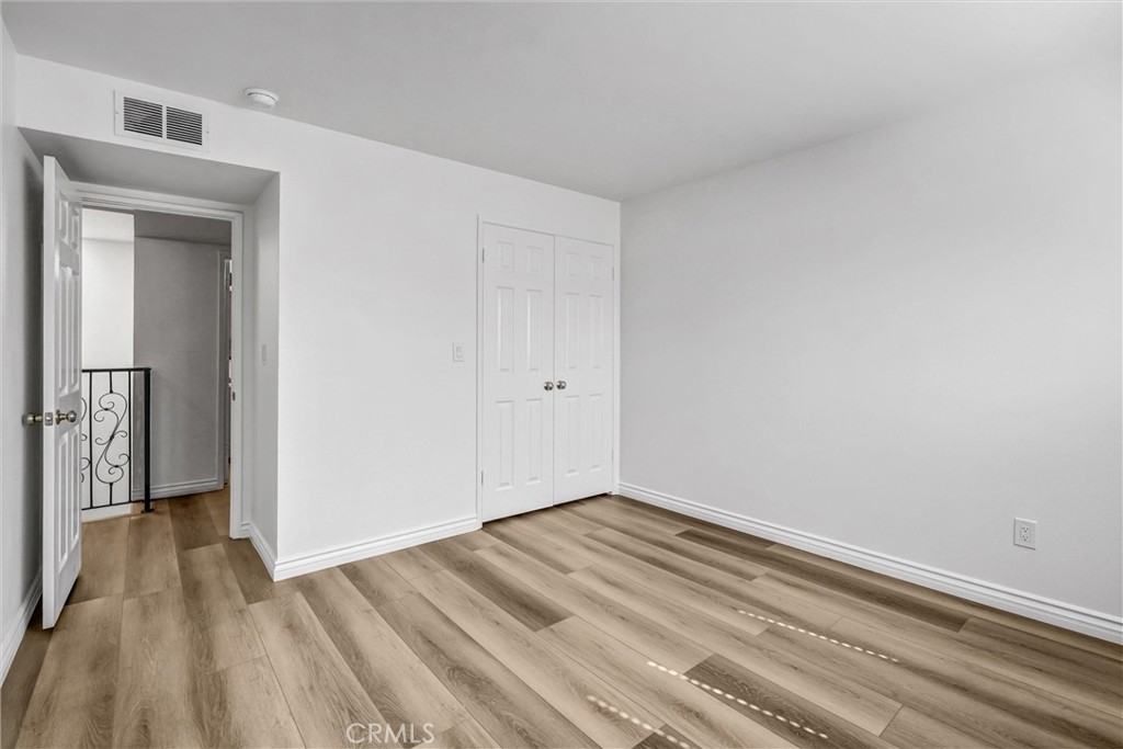 19620 Sherman Way, Unit 1 Reseda, CA 91335 - Photo 21 of 29 a view of room with wooden floor