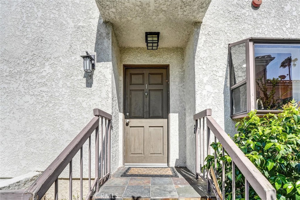 19620 Sherman Way, Unit 1 Reseda, CA 91335 - Photo 4 of 29 a view of front door of house