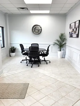 a view of workspace with a couch
