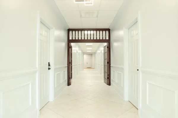 a view of an empty room with a window