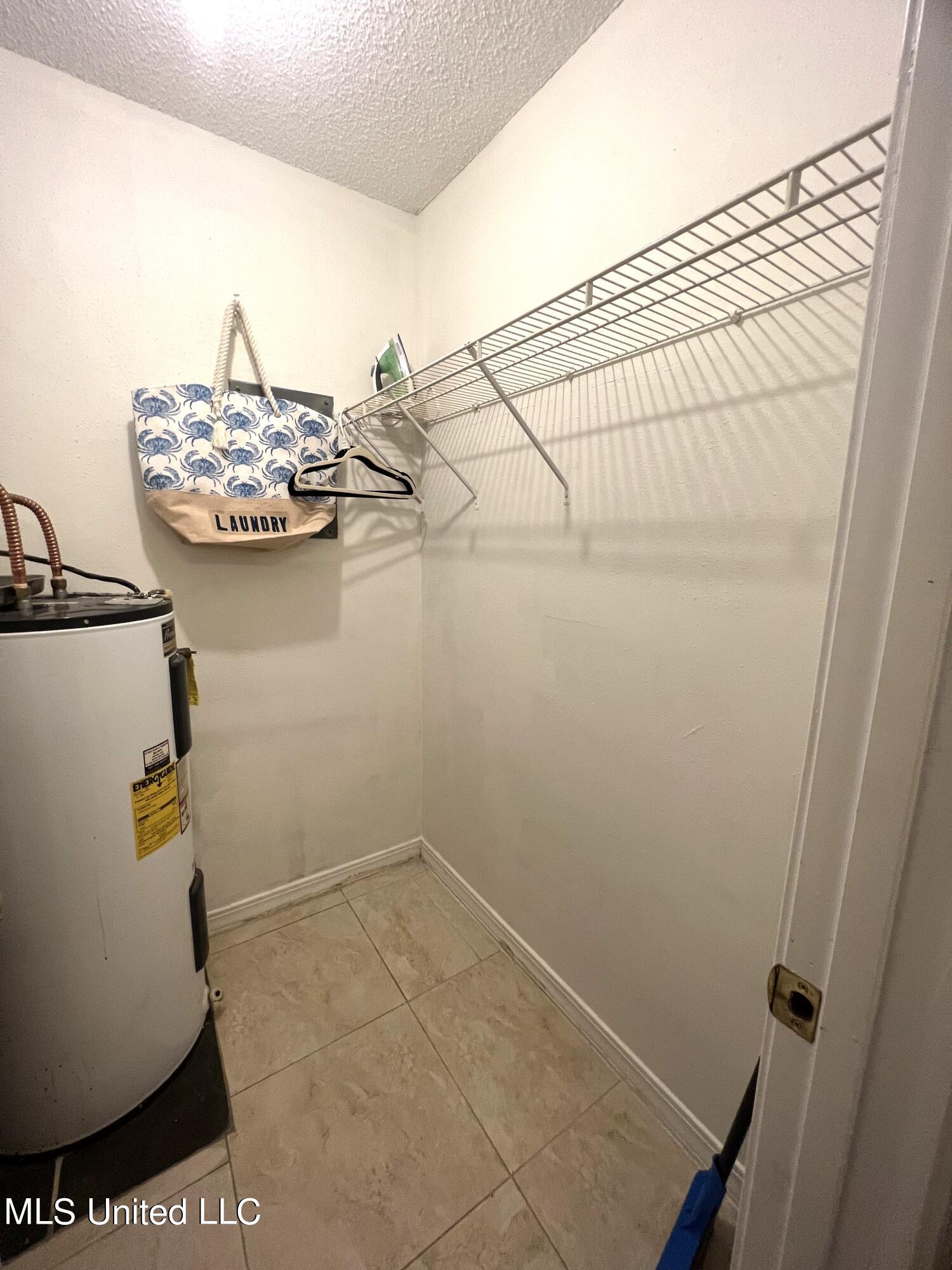 1550 East 2nd Street, Unit 89 Pass Christian, MS 39571 - Photo 11 of 15 1550 E 2nd #89 Primary Closet