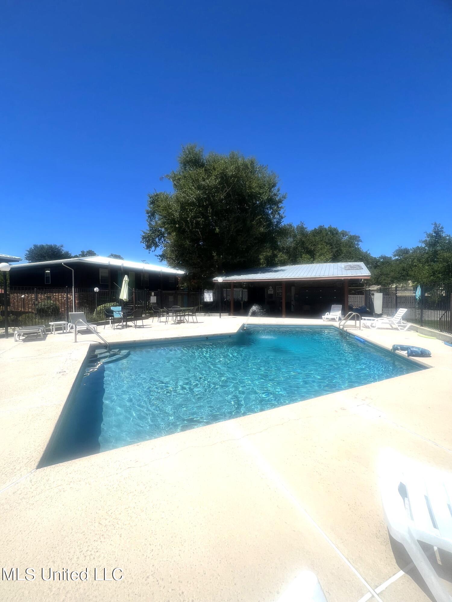 1550 East 2nd Street, Unit 89 Pass Christian, MS 39571 - Photo 14 of 15 1550 E. 2nd pool.