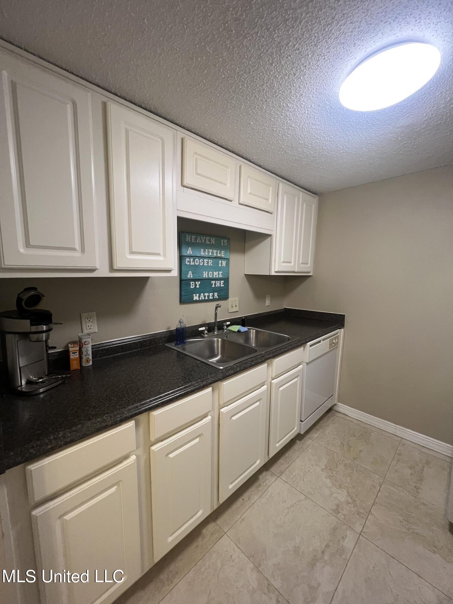 1550 East 2nd Street, Unit 89 Pass Christian, MS 39571 - Photo 7 of 15 1550 E 2nd #89 Kitch