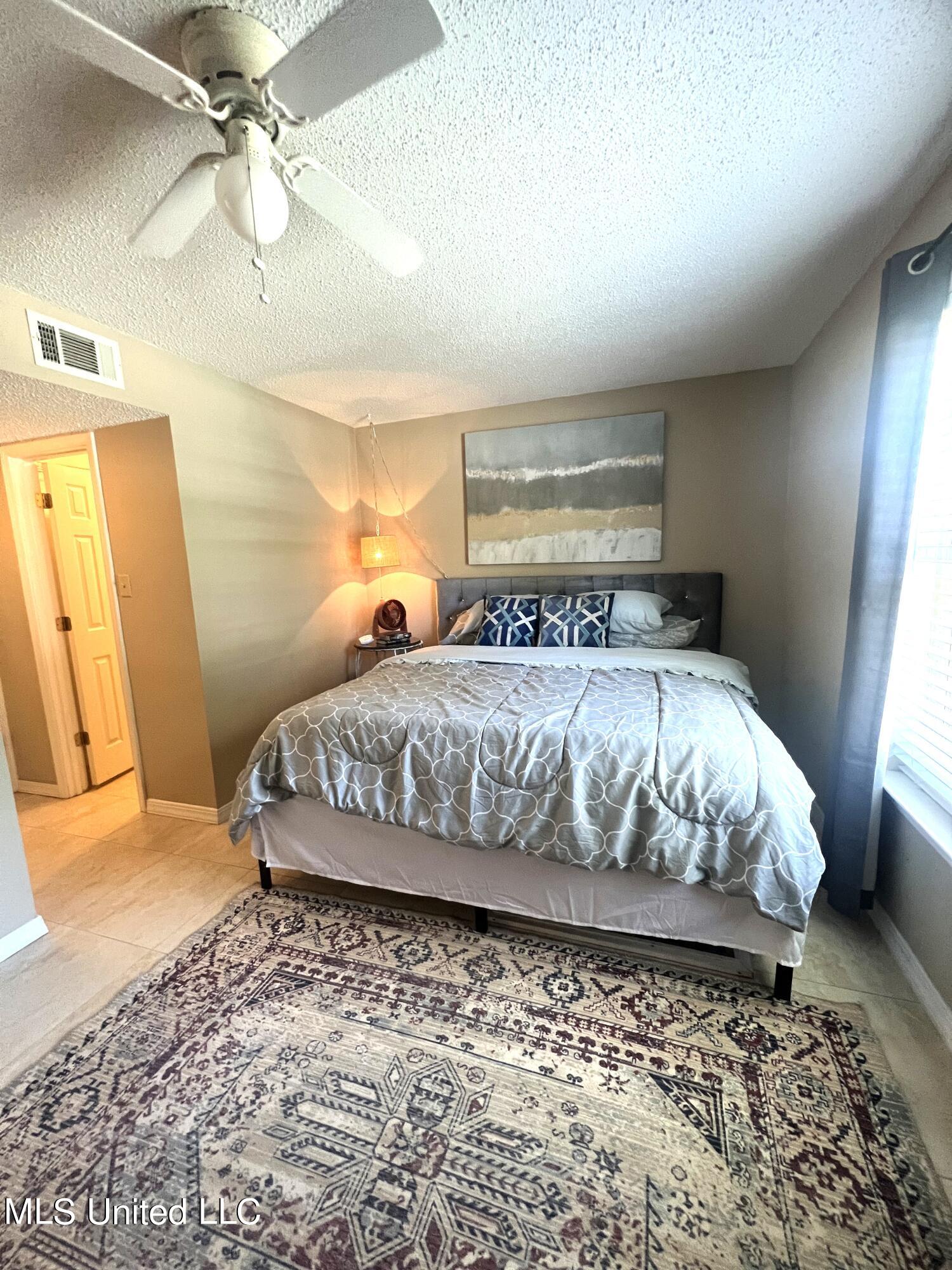 1550 East 2nd Street, Unit 89 Pass Christian, MS 39571 - Photo 8 of 15 1550 E 2nd #89 Bedroom