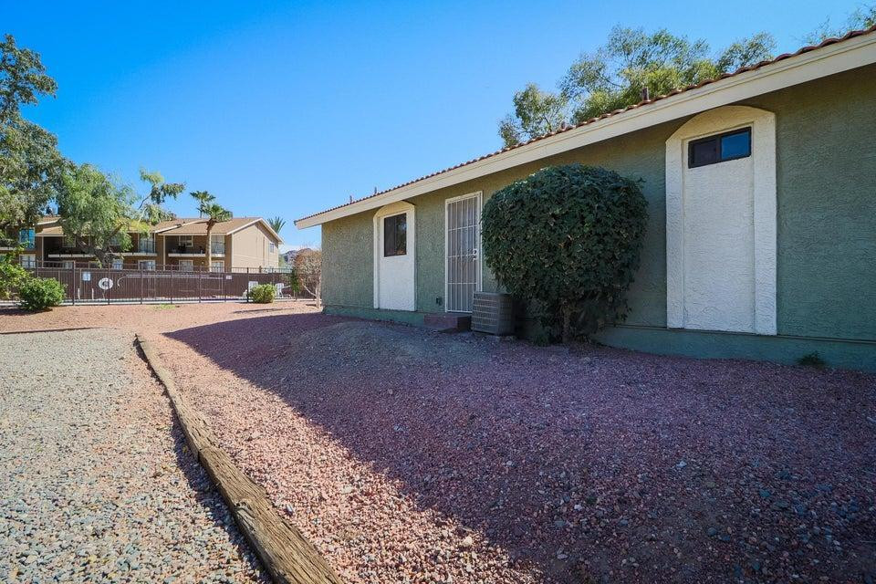 1336 East Mountain View Road, Unit 105 Phoenix, AZ 85020 - Photo 12 of 15 a view of a house with a backyard