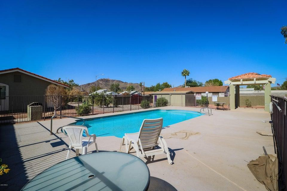 1336 East Mountain View Road, Unit 105 Phoenix, AZ 85020 - Photo 13 of 15 a terrace of a house with outdoor seating