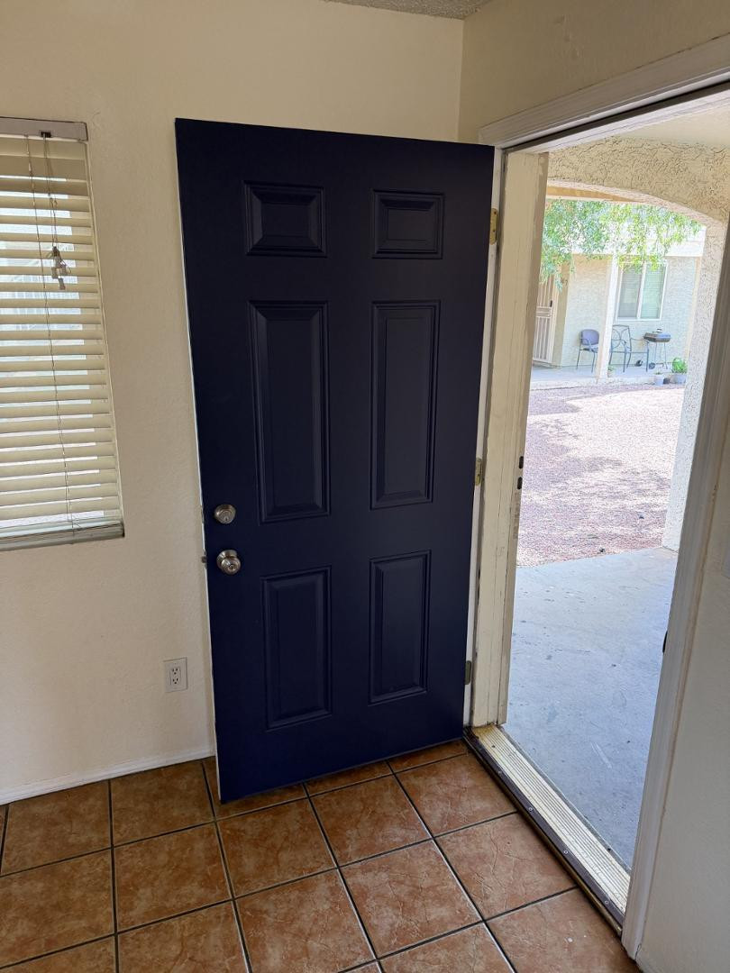 1336 East Mountain View Road, Unit 105 Phoenix, AZ 85020 - Photo 3 of 15 an empty room with windows