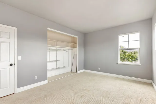 a spacious bathroom with a large tub and shower