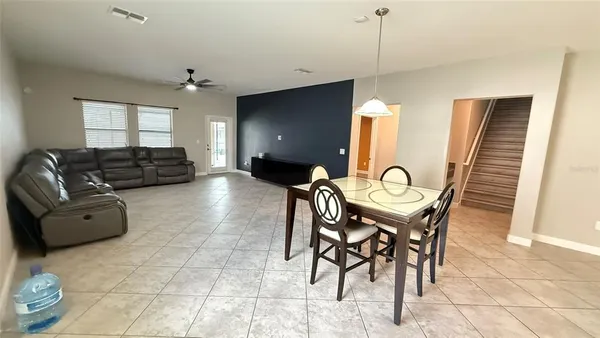 a view of a dining room with furniture