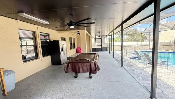 a view of an entryway with a floor to ceiling window