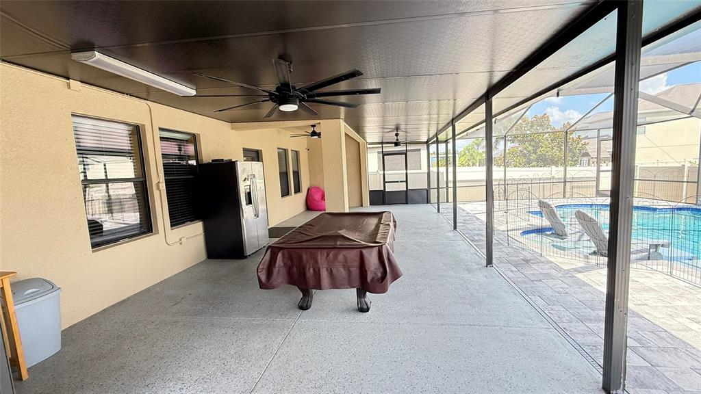 11017 Purple Martin Boulevard Riverview, FL 33579 - Photo 34 of 46 a view of a hallway with a couch and a window