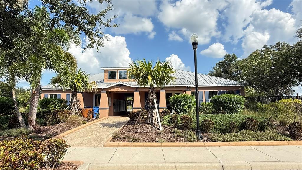 11017 Purple Martin Boulevard Riverview, FL 33579 - Photo 43 of 46 a front view of house with yard