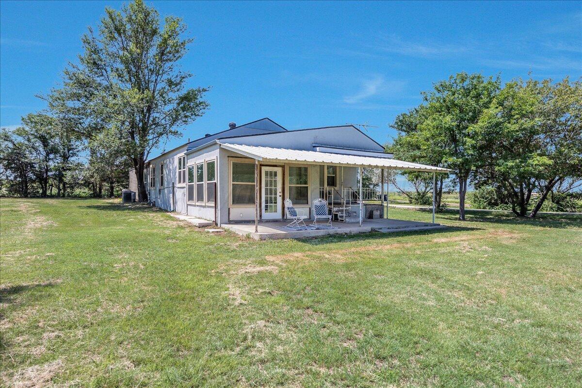 25701 Newton Road Canyon, TX 79015 - Photo 2 of 30 a view of a house with a yard balcony and sitting area