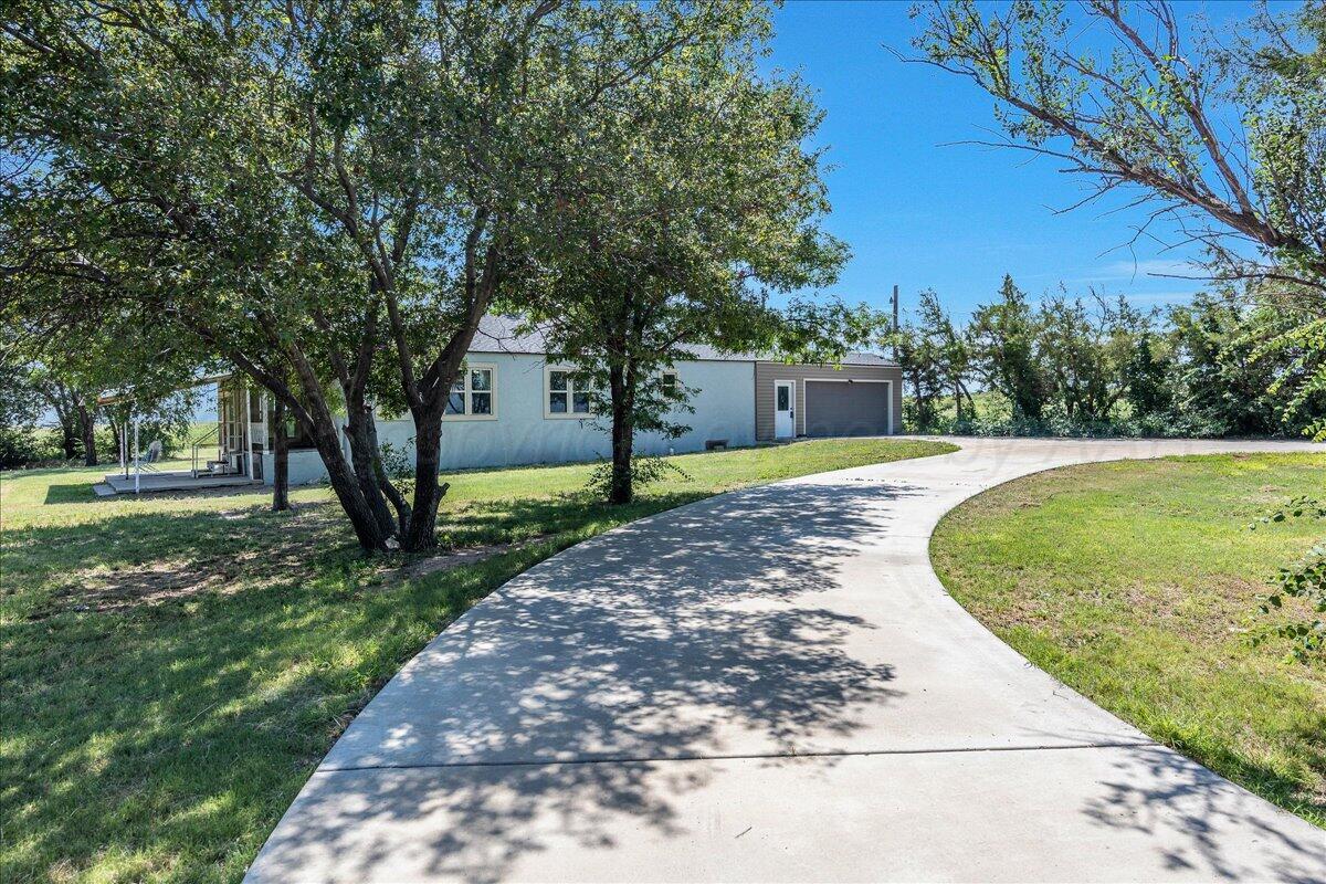 25701 Newton Road Canyon, TX 79015 - Photo 21 of 30 a view of a backyard