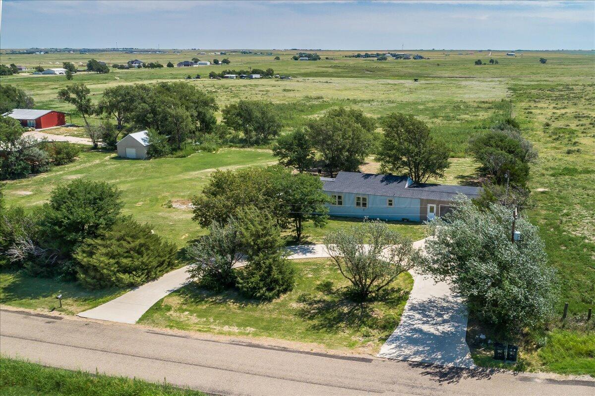 25701 Newton Road Canyon, TX 79015 - Photo 23 of 30 a view of a garden with an outdoor space