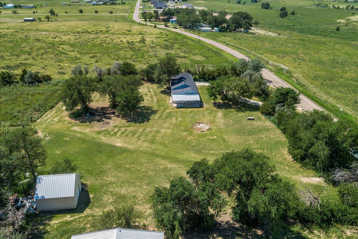 25701 Newton Road Canyon, TX 79015 - Photo 28 of 30 an aerial view of residential houses with outdoor space and trees