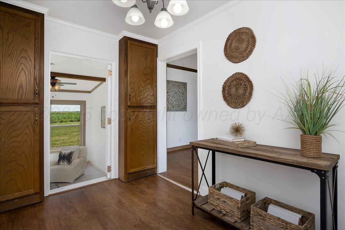 25701 Newton Road Canyon, TX 79015 - Photo 6 of 30 a view of a kitchen with a refrigerator and a stove