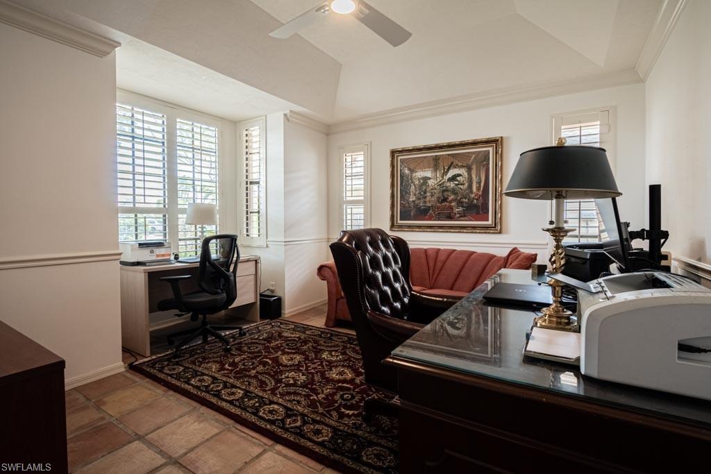 2209 Pinewoods Circle Naples, FL 34105 - Photo 23 of 46 a living room with furniture and a window