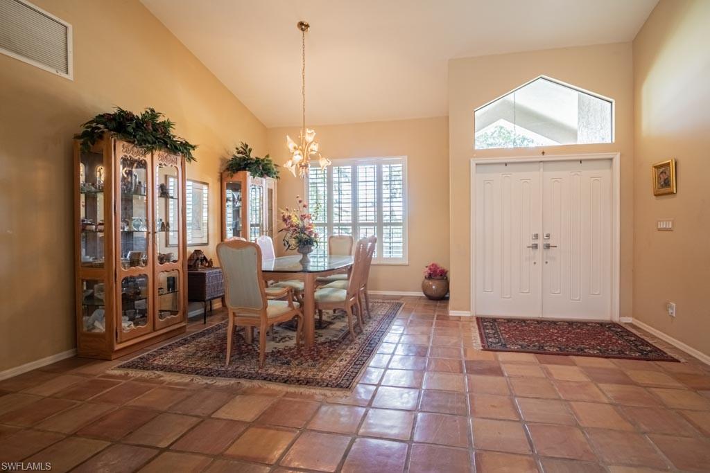 2209 Pinewoods Circle Naples, FL 34105 - Photo 3 of 46 a view of a livingroom with furniture window and outside view