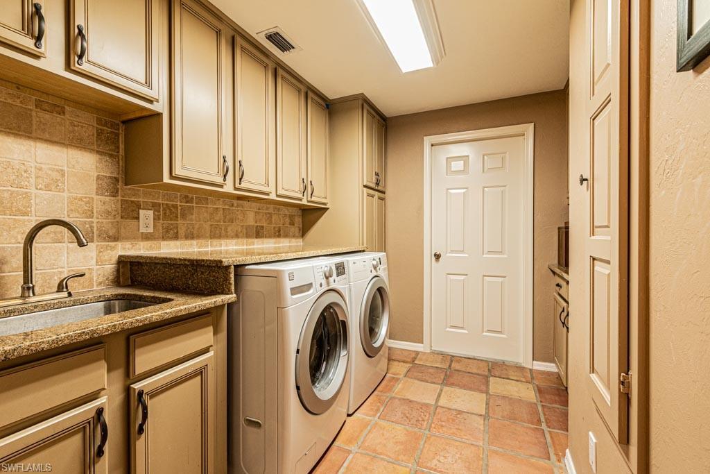 2209 Pinewoods Circle Naples, FL 34105 - Photo 34 of 46 a utility room with dryer and washer