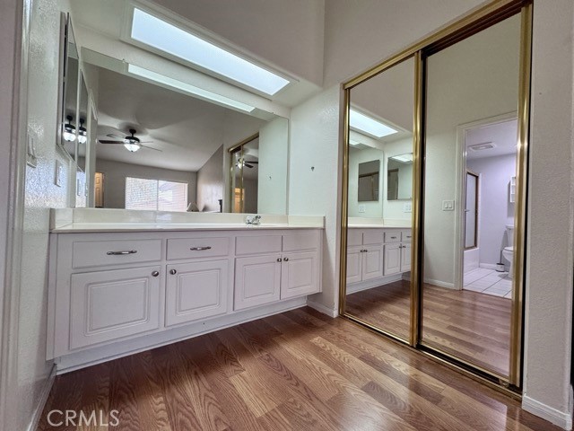 42140 Lyndie Lane, Unit 24 Temecula, CA 92591 - Photo 25 of 35 a spacious bathroom with a granite countertop sink mirror and shower