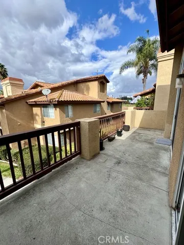 a view of a porch with a bench
