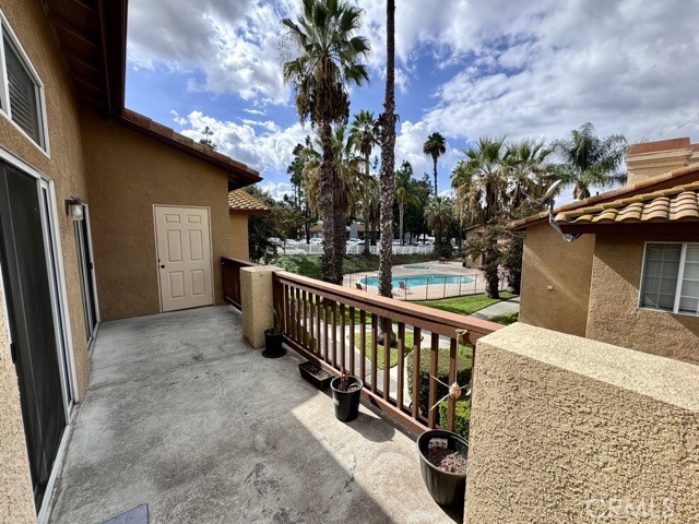 42140 Lyndie Lane, Unit 24 Temecula, CA 92591 - Photo 28 of 35 a view of a porch with a bench