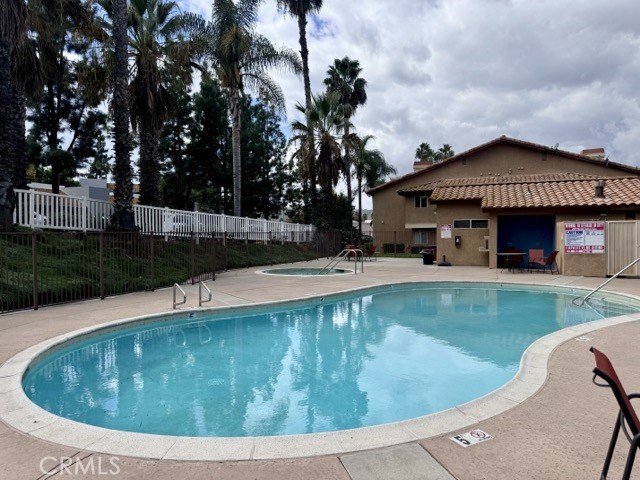 42140 Lyndie Lane, Unit 24 Temecula, CA 92591 - Photo 32 of 35 a view of a house with swimming pool